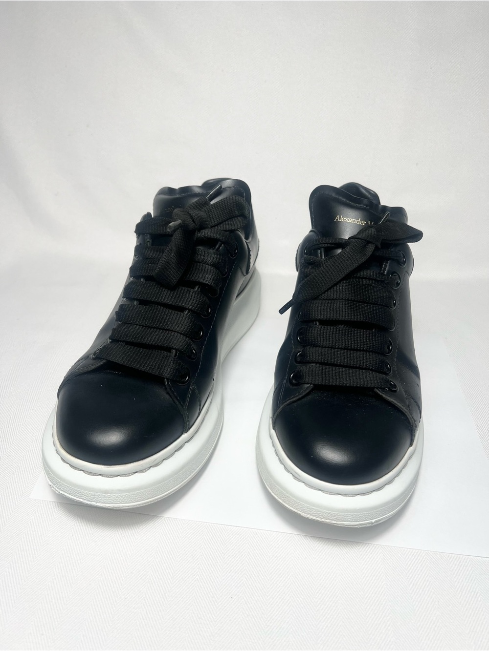 Alexander McQueen Black and White Unisex Sneakers. Authentic